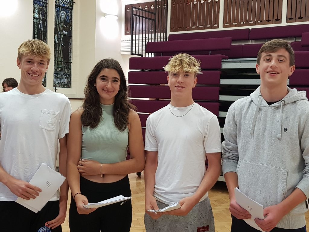 4 students with their GCSE results